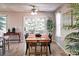 Bright dining room with hardwood floors and sliding glass doors at 6475 Orion Way, Arvada, CO 80007