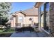 Small patio with table and chairs, great for relaxing at 6475 Orion Way, Arvada, CO 80007