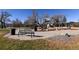 Community playground with playset and benches at 6475 Orion Way, Arvada, CO 80007
