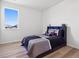 Modern bedroom with a double bed and LED-lit headboard at 3051 Newfound Lake Rd, Berthoud, CO 80513