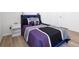 Cozy bedroom with double bed, LED-lit headboard, and a nightstand at 3051 Newfound Lake Rd, Berthoud, CO 80513