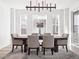 Elegant dining room with hardwood floors and chandelier at 3051 Newfound Lake Rd, Berthoud, CO 80513