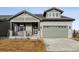 Beautiful two-story home with a large front yard and attached garage at 3051 Newfound Lake Rd, Berthoud, CO 80513