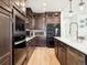 Modern kitchen with stainless steel appliances and an island at 3051 Newfound Lake Rd, Berthoud, CO 80513