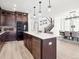 Open concept kitchen features an island and dining area at 3051 Newfound Lake Rd, Berthoud, CO 80513