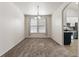 Bright dining room with neutral decor and carpeting at 1063 Halfmoon Dr, Castle Rock, CO 80104