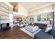 Open living area with hardwood floors and a view of the kitchen at 160 Ponderosa Dr, Boulder, CO 80303