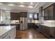 Gourmet kitchen with stainless steel appliances and white subway tile backsplash at 5069 Castle Pines S Dr, Castle Rock, CO 80108