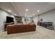 Finished basement with fireplace and home gym at 5069 Castle Pines S Dr, Castle Rock, CO 80108