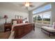 Spacious main bedroom with a luxurious feel and lots of natural light at 5069 Castle Pines S Dr, Castle Rock, CO 80108
