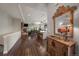 Bright and spacious entryway with hardwood floors and view to living room and kitchen at 5069 Castle Pines S Dr, Castle Rock, CO 80108