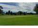 Partial view of a green and fairways at 13606 E Bates Ave # 304, Aurora, CO 80014