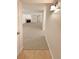 Condo entryway with tiled flooring and view to living room at 10243 E Peakview Ave # A103, Englewood, CO 80111