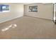 Well-lit bedroom with neutral walls and carpeted floors at 10243 E Peakview Ave # A103, Englewood, CO 80111