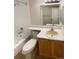Clean bathroom with single sink vanity and bathtub at 10243 E Peakview Ave # A103, Englewood, CO 80111