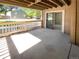 Private patio with sliding glass door access at 10243 E Peakview Ave # A103, Englewood, CO 80111