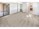 Bright bedroom with sliding glass door to patio access at 10243 E Peakview Ave # A103, Englewood, CO 80111