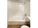 Updated bathroom with a large, round bathtub at 10243 E Peakview Ave # A103, Englewood, CO 80111