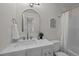 Stylish bathroom with marble countertops and modern fixtures at 8449 W Dakota Ave # C, Lakewood, CO 80226