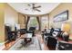 Living room with hardwood floors, fireplace and recessed lighting at 5704 N Gibralter Way # 105, Aurora, CO 80019