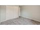 Spacious bedroom with double closets and neutral walls at 8520 S Estes St # H, Littleton, CO 80128