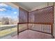 Wooden patio with lattice sides, offering yard views at 1225 Baker St, Longmont, CO 80501