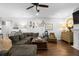 Spacious living room features a fireplace, sectional sofa, and ample natural light at 637 W 174Th Ave, Broomfield, CO 80023