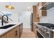 Stainless steel appliances and a large kitchen island at 1283 Meade St, Denver, CO 80204