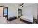 Charming bedroom with built-in shelving and a ceiling fan at 2452 Shetland Trl, Elizabeth, CO 80107