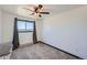 Simple bedroom with carpeted floors and a ceiling fan at 2452 Shetland Trl, Elizabeth, CO 80107