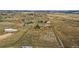 Aerial view showing house, outbuildings, and extensive land at 2452 Shetland Trl, Elizabeth, CO 80107