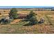 Aerial view of ranch style home with detached shop and large lot at 2452 Shetland Trl, Elizabeth, CO 80107
