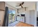 Bright kitchenette with access to backyard patio and scenic views at 2452 Shetland Trl, Elizabeth, CO 80107