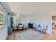 Dining room with hardwood floors and view to kitchen at 2452 Shetland Trl, Elizabeth, CO 80107