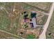 Aerial view of house, detached garage and large lot at 2452 Shetland Trl, Elizabeth, CO 80107