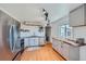 Modern kitchen with stainless steel appliances and wood countertop at 2452 Shetland Trl, Elizabeth, CO 80107