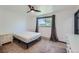 Spacious bedroom with ample natural light and carpeted floor at 2452 Shetland Trl, Elizabeth, CO 80107