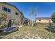 Backyard with deck, landscaping, and trampoline at 2452 Shetland Trl, Elizabeth, CO 80107