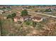 Aerial view showing house, detached garage, and surrounding land at 2452 Shetland Trl, Elizabeth, CO 80107