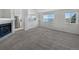 Spacious living room with fireplace and lake view at 6850 Xavier Cir # 12, Westminster, CO 80030