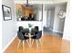 Charming dining area with a black table and four chairs at 100 Park Ave # 1208, Denver, CO 80205