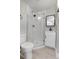 Modern bathroom with a glass shower and white vanity at 2103 S Lafayette St, Denver, CO 80210