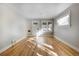 Living room featuring hardwood floors and bright natural light at 2103 S Lafayette St, Denver, CO 80210