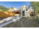 Private backyard with a new wood fence and gravel area at 2103 S Lafayette St, Denver, CO 80210