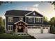 Two-story home with dark siding, stone accents, and three-car garage at 941 Saint Andrews Ln, Louisville, CO 80027
