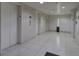 Clean and well-lit hallway with elevators nearby at 891 14Th St # 1612, Denver, CO 80202