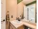 Clean bathroom with single sink vanity at 11254 Oakland Dr, Commerce City, CO 80640