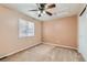 Bedroom with ceiling fan and window at 11254 Oakland Dr, Commerce City, CO 80640