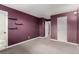 Purple bedroom with window and closet at 1021 Carr St # 22, Lakewood, CO 80214