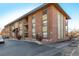 Brick apartment building with ample parking at 1021 Carr St # 22, Lakewood, CO 80214